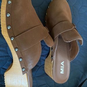 Mia clogs.  Worn once - still have a lot of life left.  Like new condition.